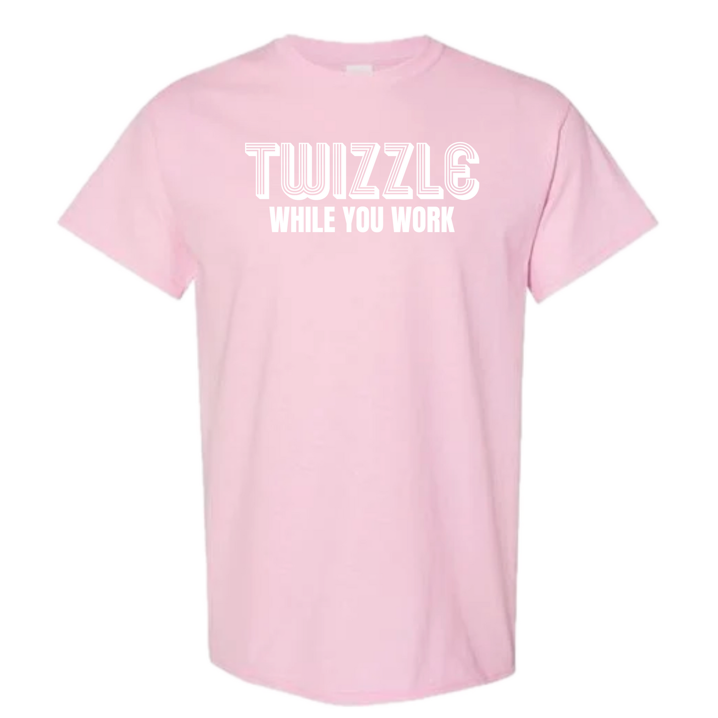 A light pink short-sleeve crewneck t-shirt with the words 'TWIZZLE WHILE YOU WORK' printed in white across the chest, displayed on a solid white background.
