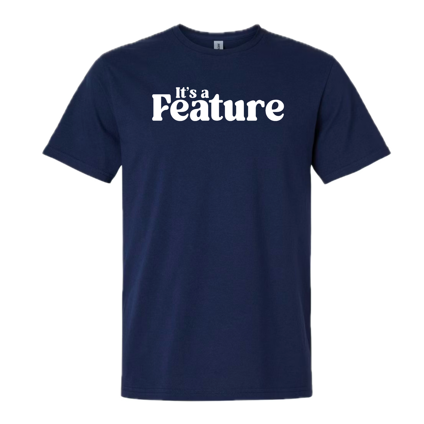 Navy t-shirt with a the phrase ‘It’s a Feature’ in white and on a white background