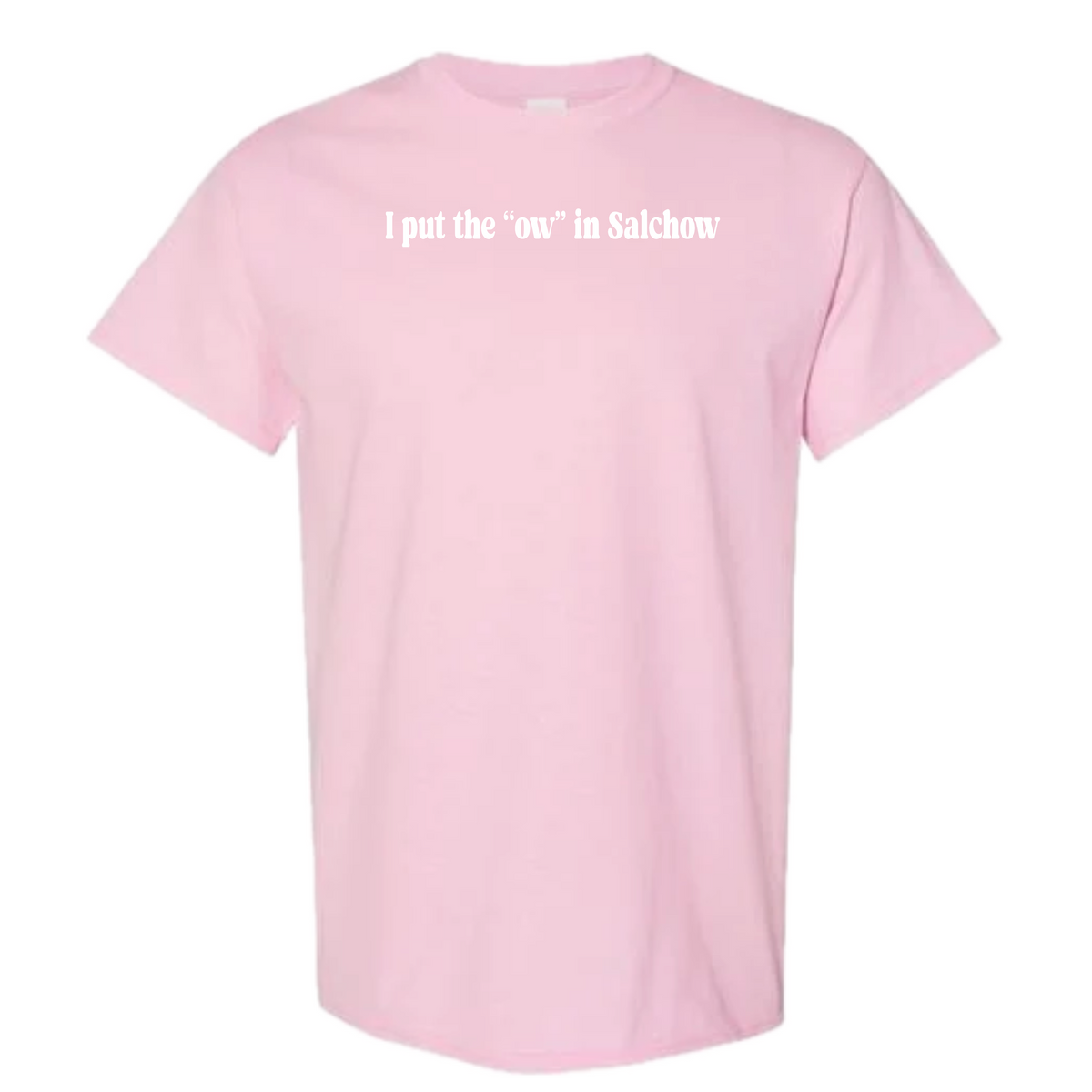 A light pink short-sleeve crewneck t-shirt with the white printed text 'I put the "ow" in Salchow' across the chest, displayed on a solid white background.