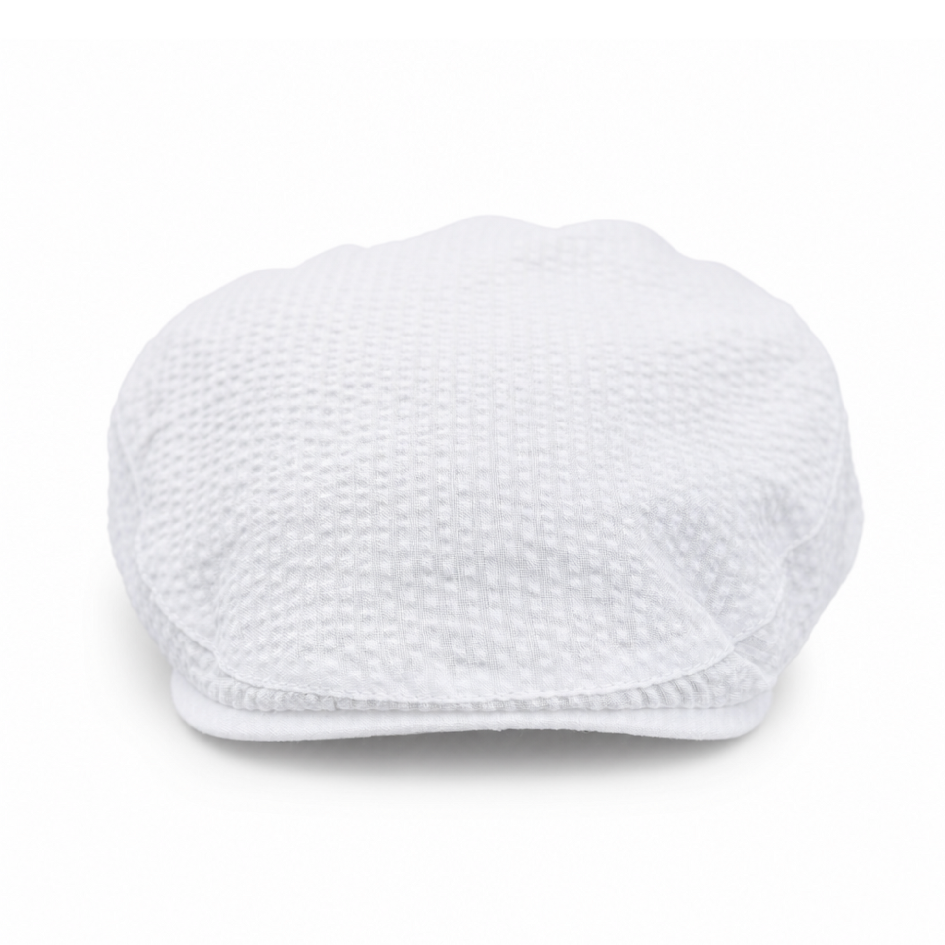 White textured cap on a white background
